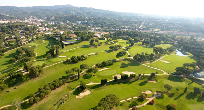 Aerial view of Club de Golf Llavaneras, its fairways running down towards the Maresme coast