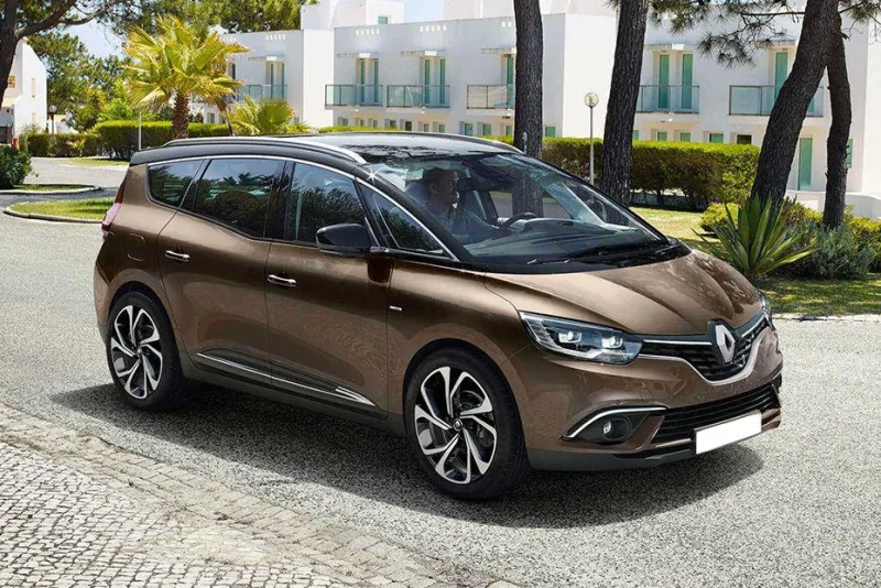 A bronze Renault Grand Sc&eacute;nic seven seat people carrier, front three quarter view